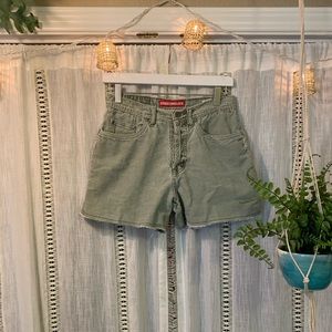 high-waisted green corduroy shorts